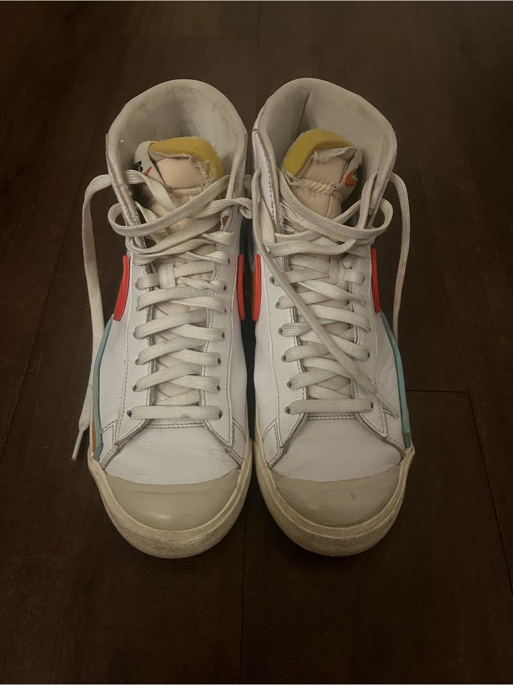 Nike White High-Top Sneakers with Red and Teal Accents